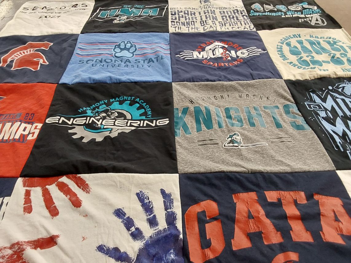T-shirt quilt featuring harmony magnet academy knights, sonoma state university gators by Josue from CA
