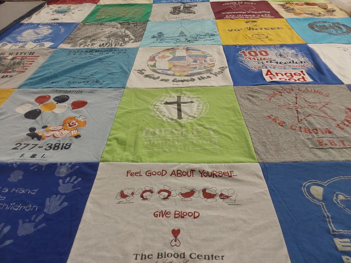 T-shirt quilt with community service, volunteering themes by Terry from TX