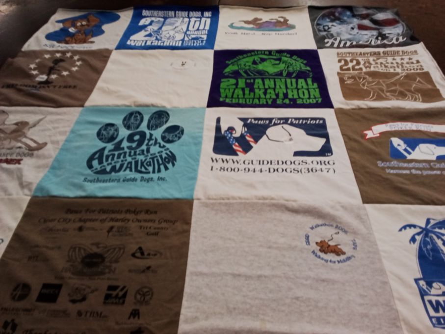 T-shirt quilt with guide dogs, animal welfare themes by Michelle from MI