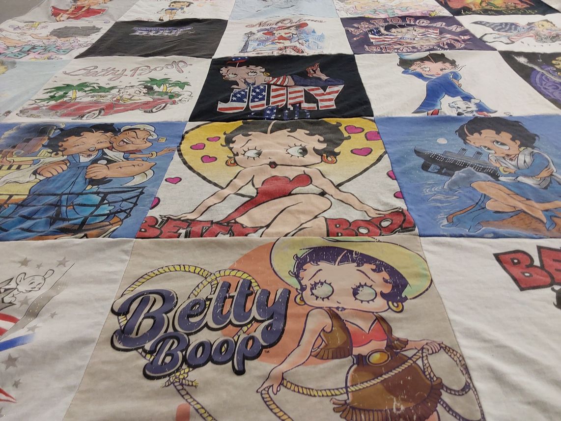 T-shirt quilt with cartoons, animation themes by Martha from OH