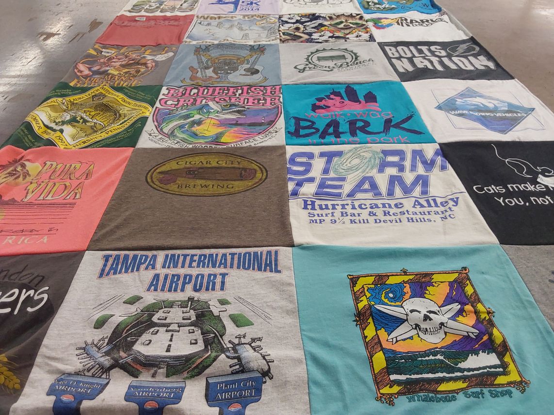 T-shirt quilt with fishing, brewing themes by Laura from FL