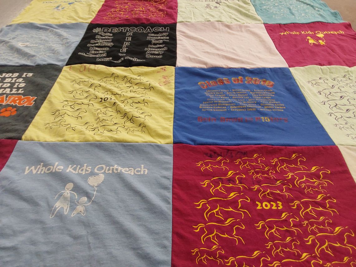 T-shirt quilt with coaching, community service themes by Michelle from MO