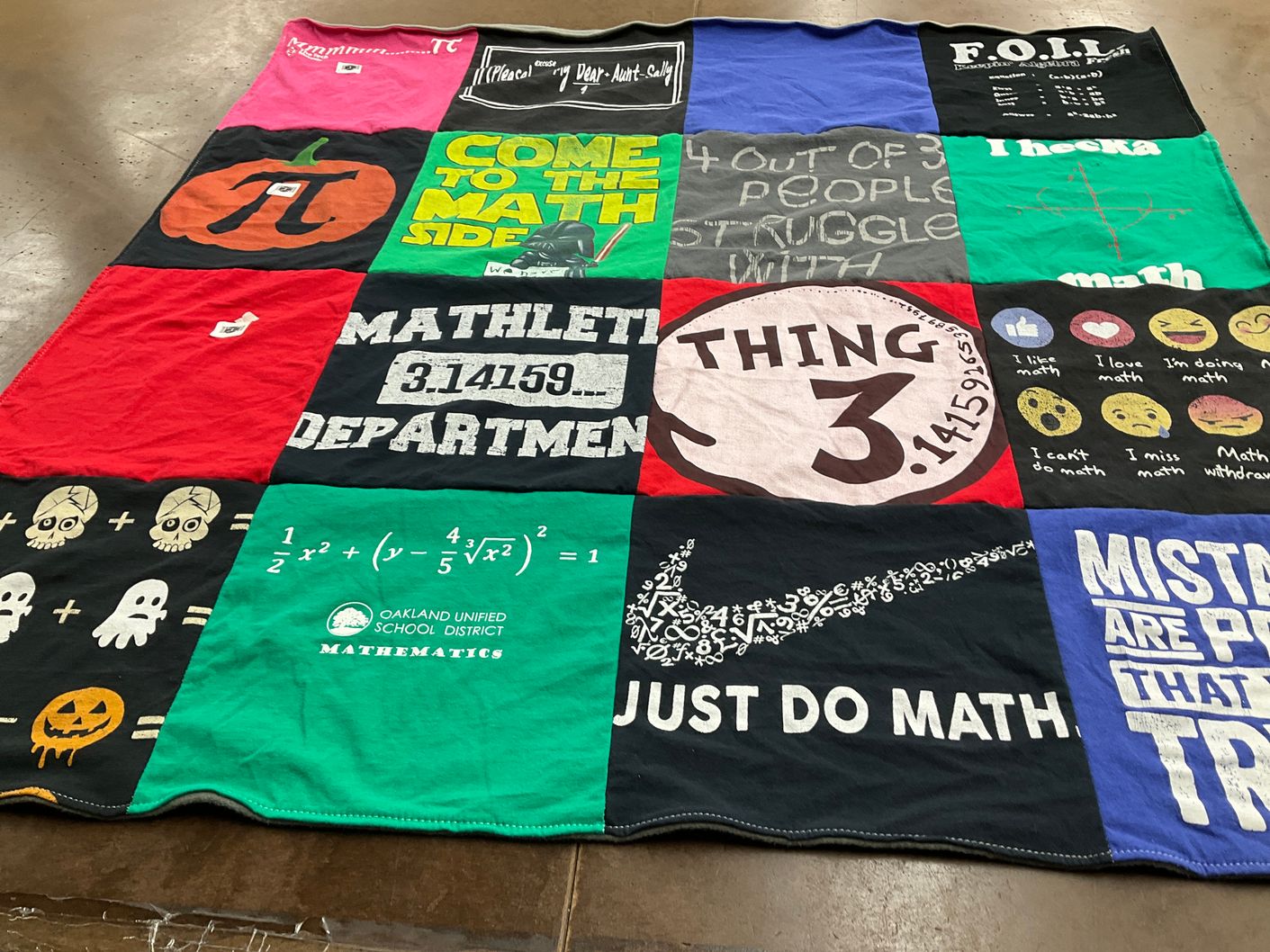 T-shirt quilt with mathematics, math education themes by Mary from CA