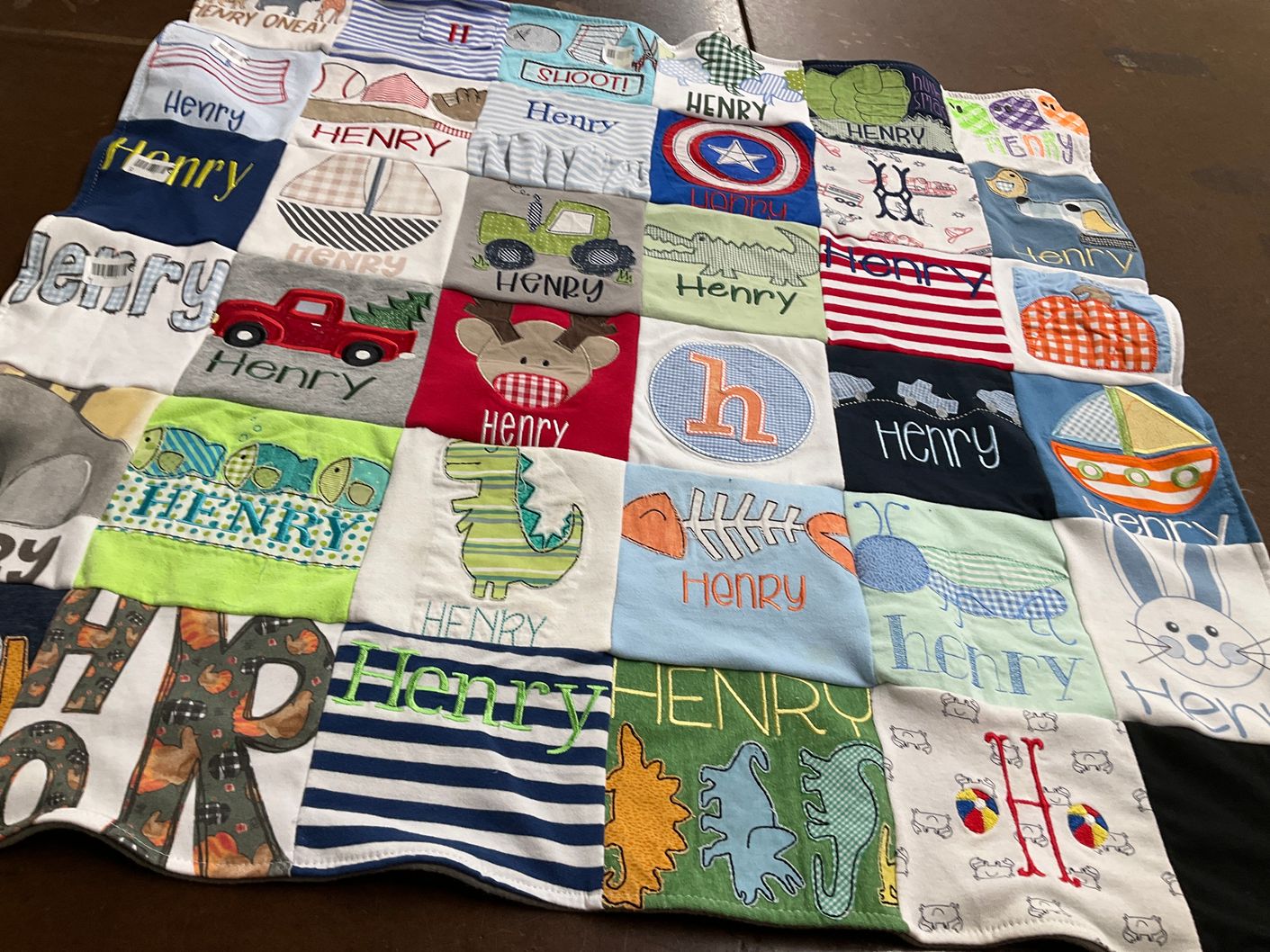 T-shirt quilt with children, toys themes by Victoria from AR