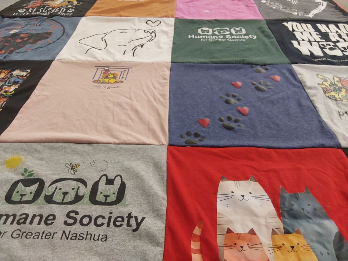 T-shirt quilt with animal welfare, pets themes by Susan from NH