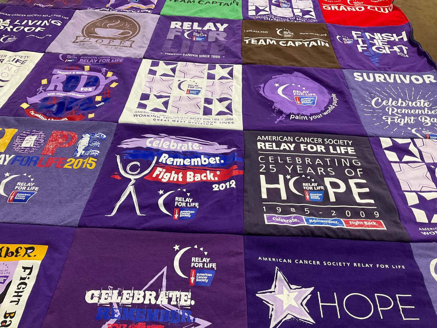 T-shirt quilt with cancer awareness, charity events themes by Lori from CO