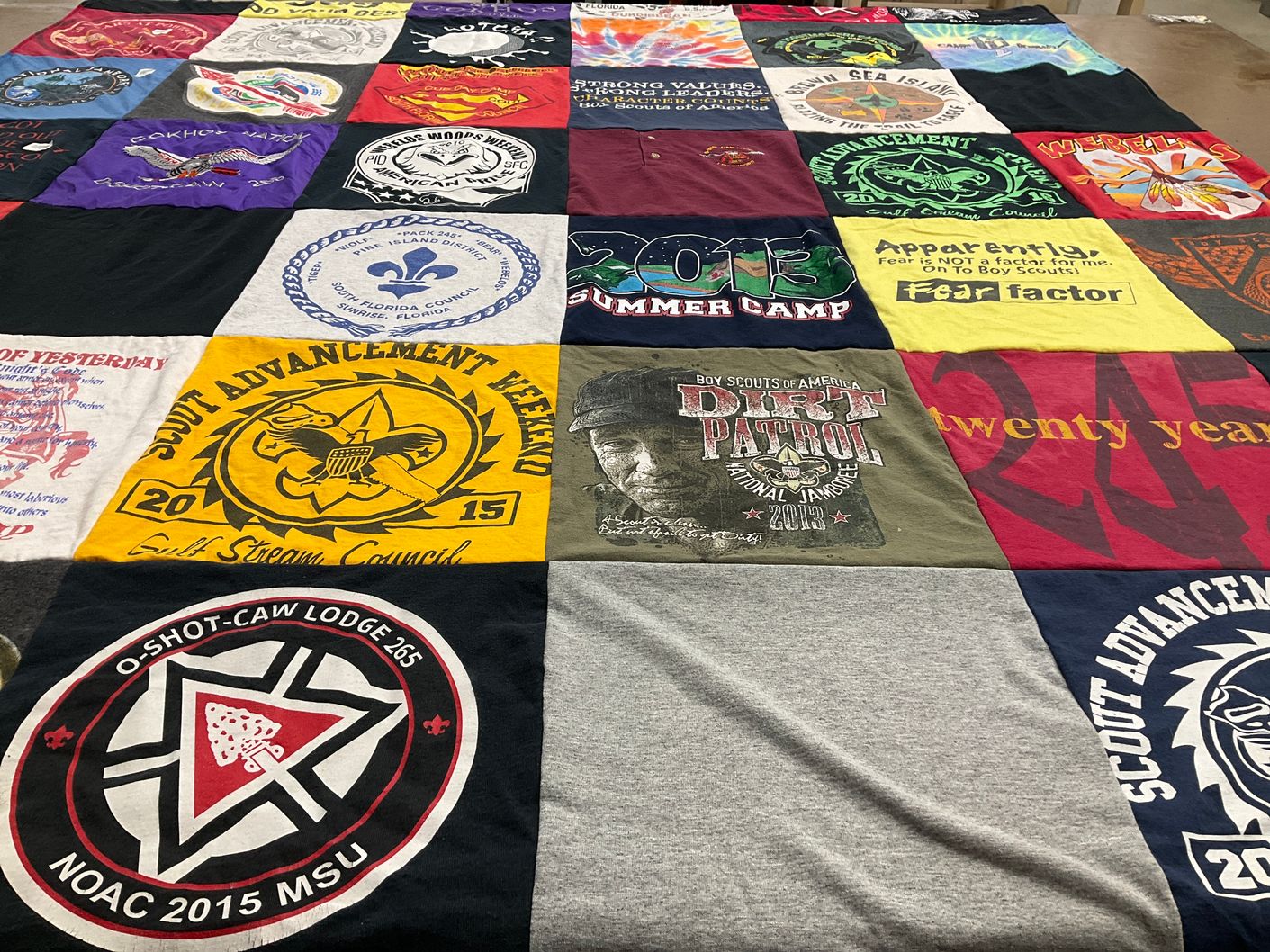 T-shirt quilt with scouting, outdoor activities themes by Mark from FL