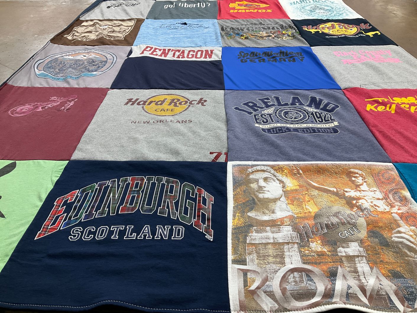 T-shirt quilt with travel, tourism themes by Julie from MO