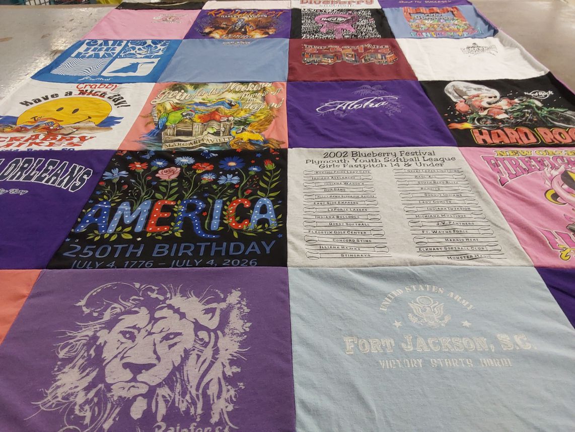 T-shirt quilt with festivals, softball themes by Jackie from IN
