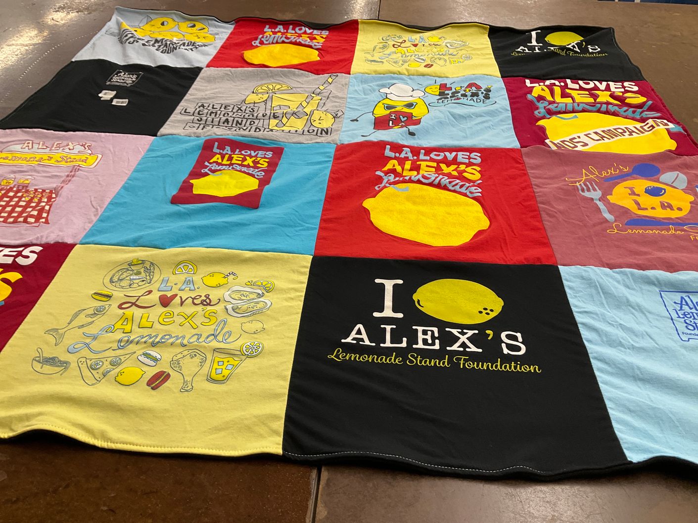 T-shirt quilt with charity, lemonade stands themes by Rachel from MD