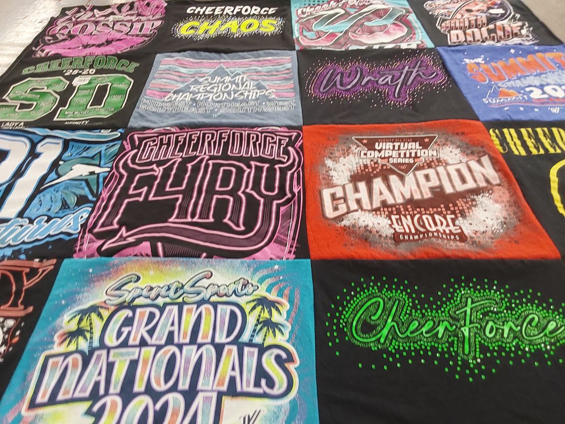 T-shirt quilt with cheerleading themes by April from CA