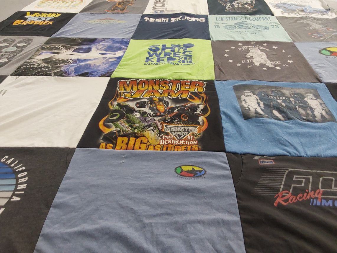 T-shirt quilt with monster trucks, racing themes by Tara from CA