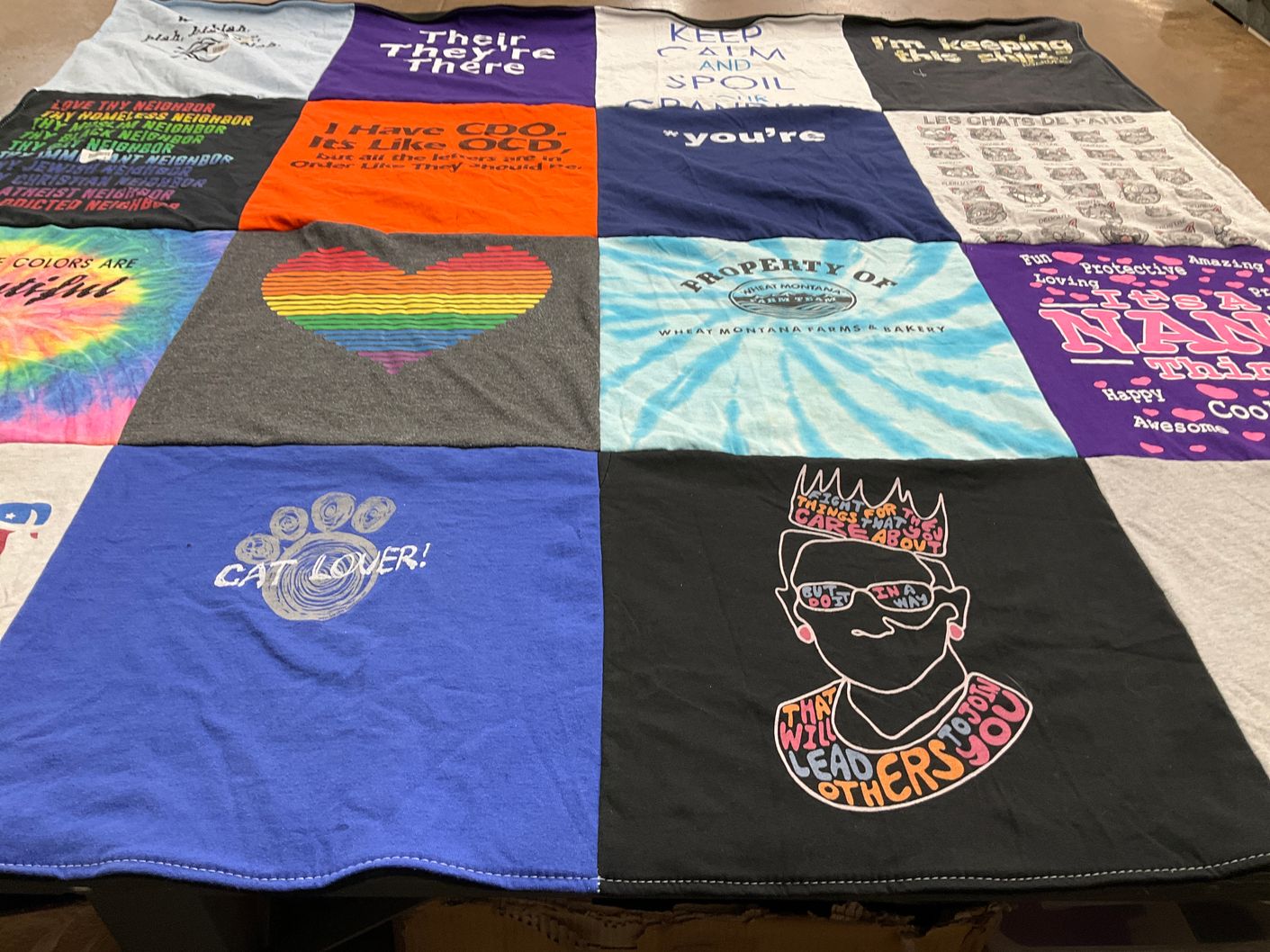 T-shirt quilt with cats, community themes by Susan from NY