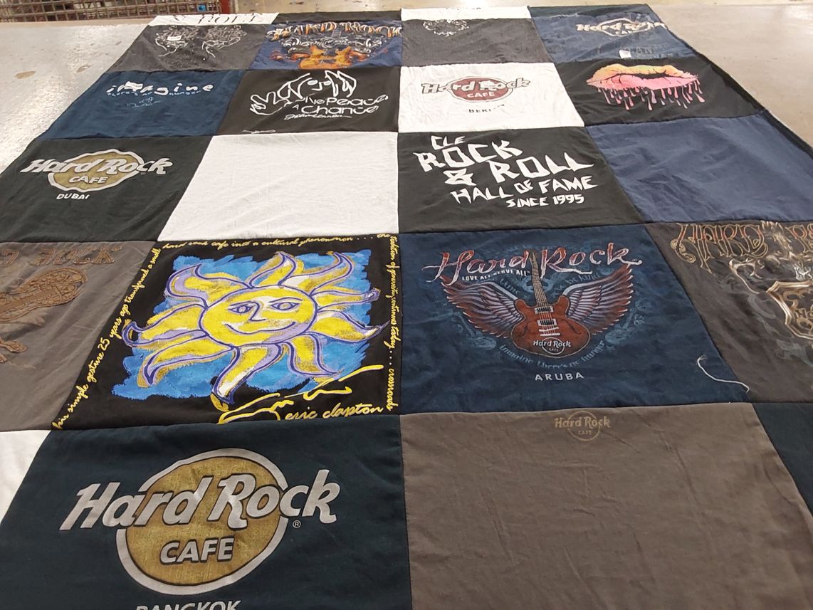 T-shirt quilt with music, travel themes by Valerie from NY