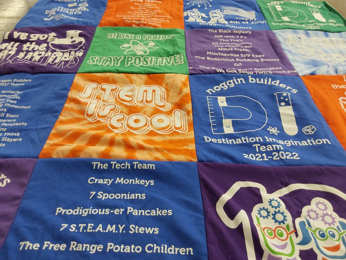 T-shirt quilt with science, technology themes by Amy from IL