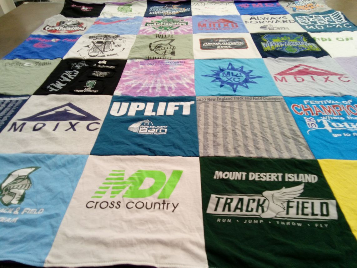 T-shirt quilt featuring mount desert island cross country team, mount desert island track and field team by Jennifer from ME