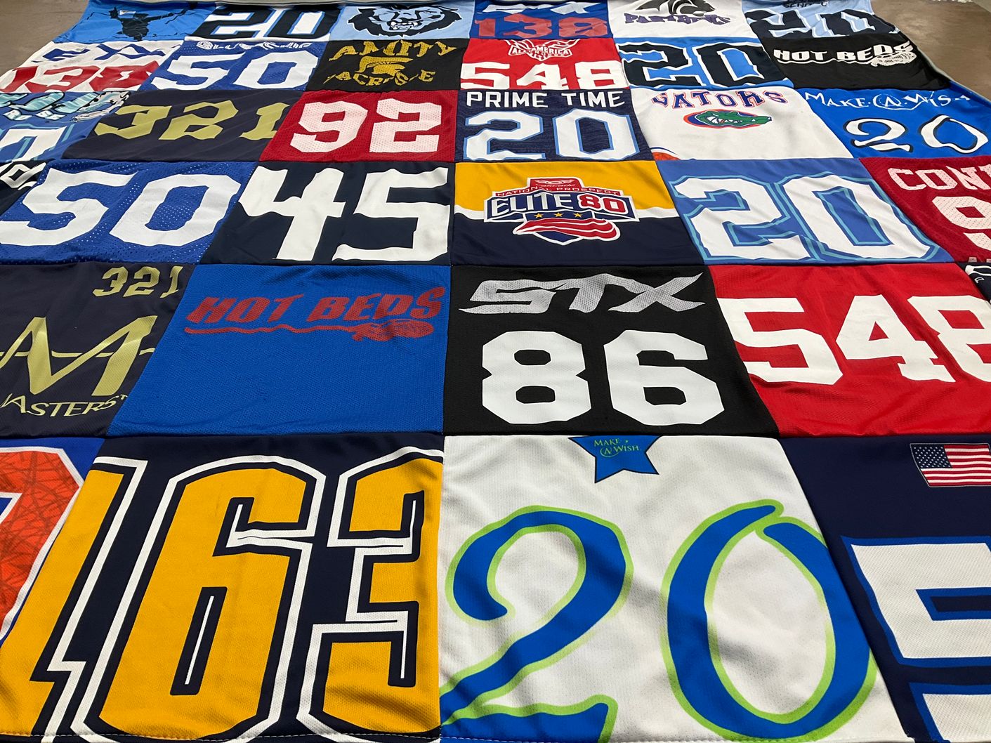 T-shirt quilt with lacrosse themes by Alison from CT