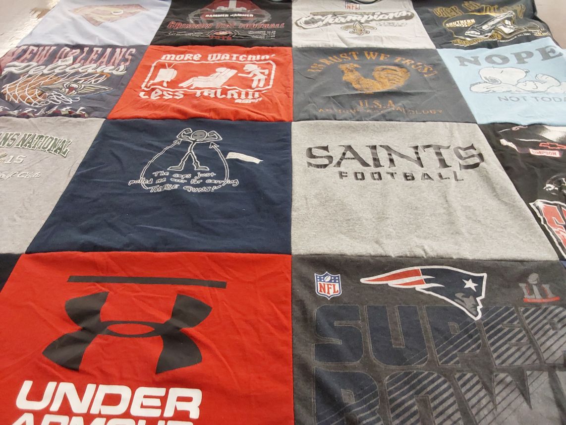 T-shirt quilt featuring new orleans saints, new england patriots by Ginger from MS