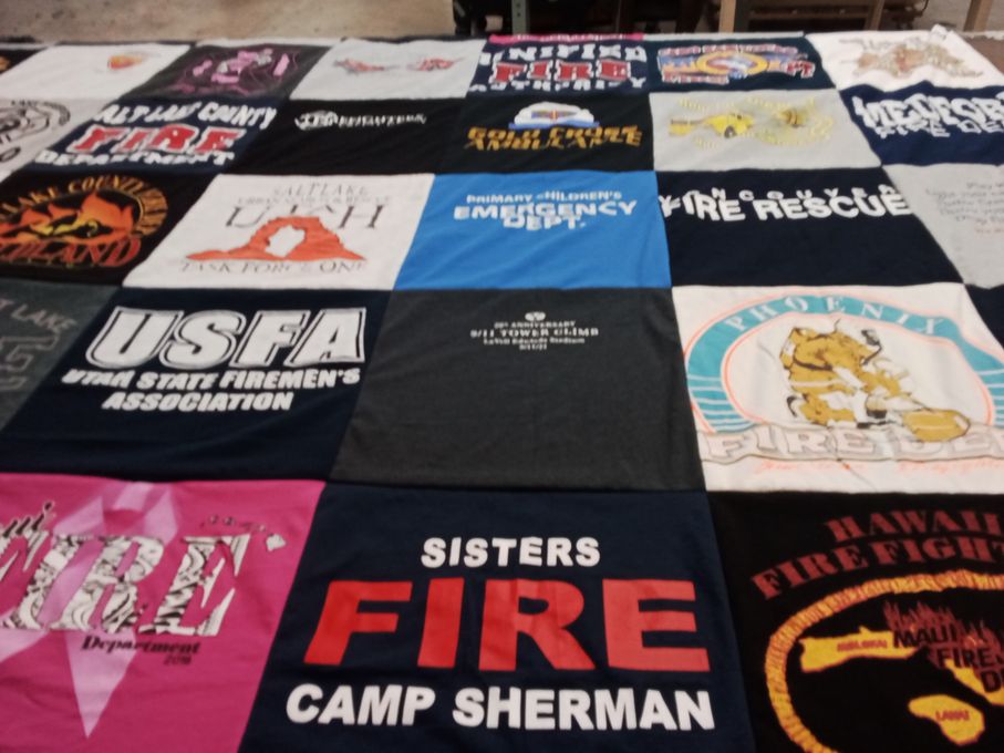 T-shirt quilt with firefighting, emergency services themes by Ron from UT
