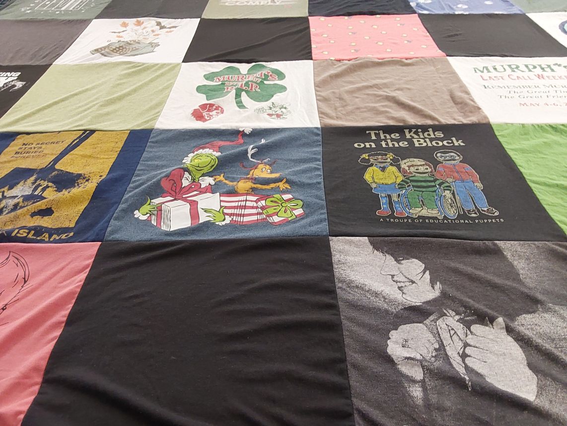 T-shirt quilt with educational puppetry themes by Carla from PA