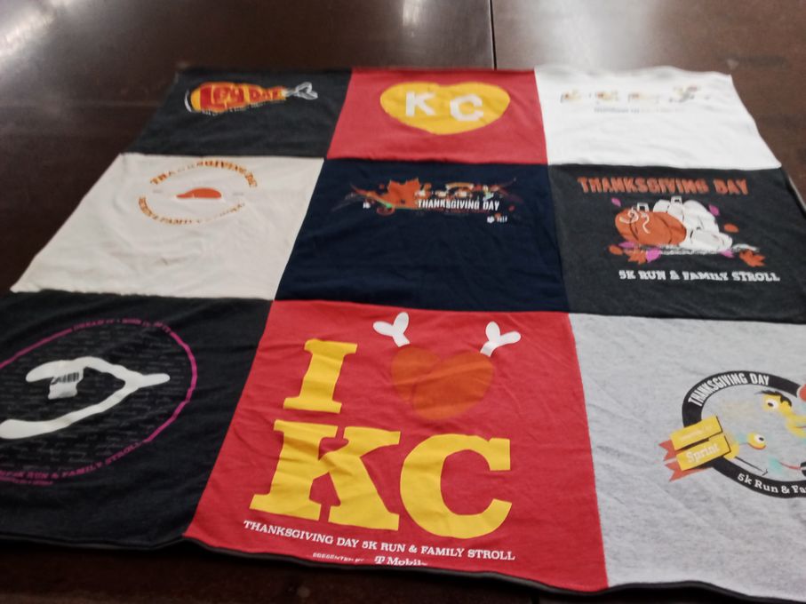 T-shirt quilt with running, family events themes by Lisa from TX