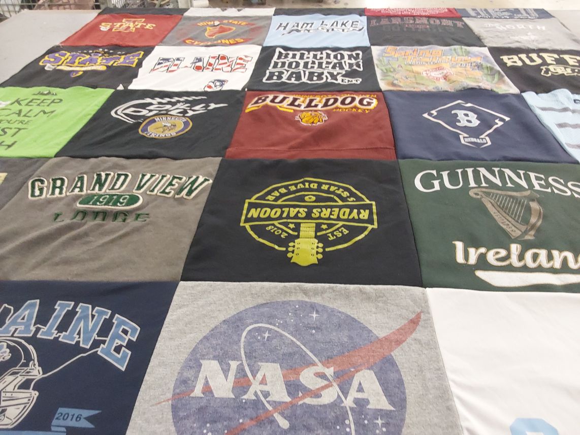T-shirt quilt featuring bulldog hockey by Julie from MN
