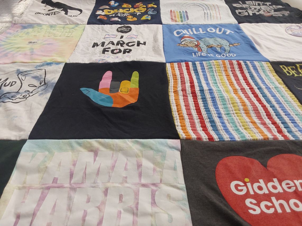 T-shirt quilt with activism, environment themes by Rebecca from WA