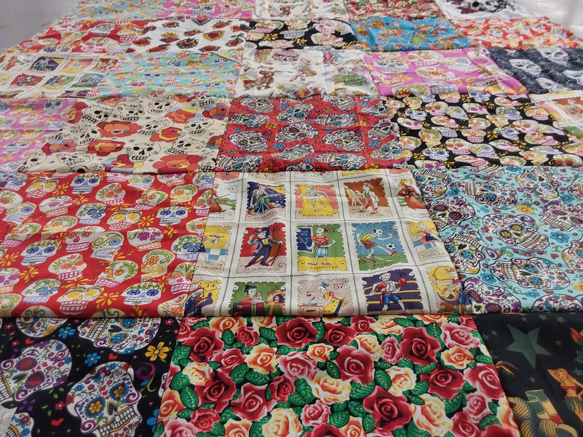 T-shirt quilt with day of the dead, sugar skulls themes by Rinda from OK
