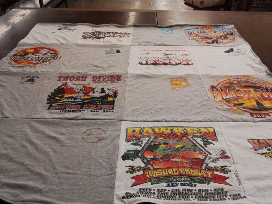 T-shirt quilt with firefighting, wildfire themes by Kathleen from TX