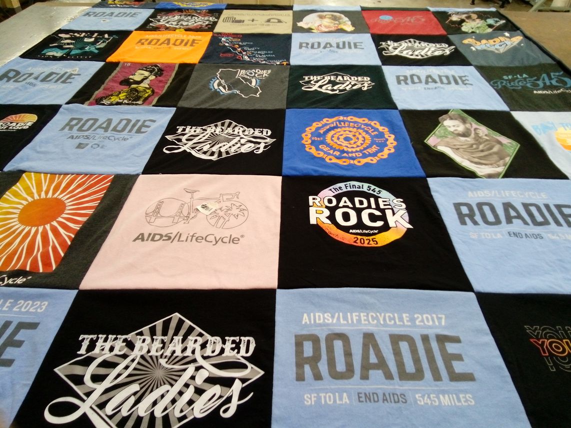 T-shirt quilt with cycling, charity themes by Andrea from CA
