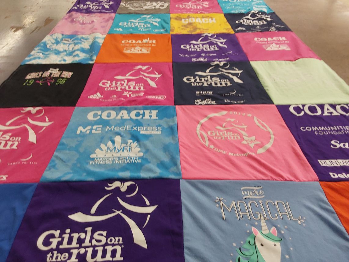 T-shirt quilt with running, community service themes by Elizabeth from TX