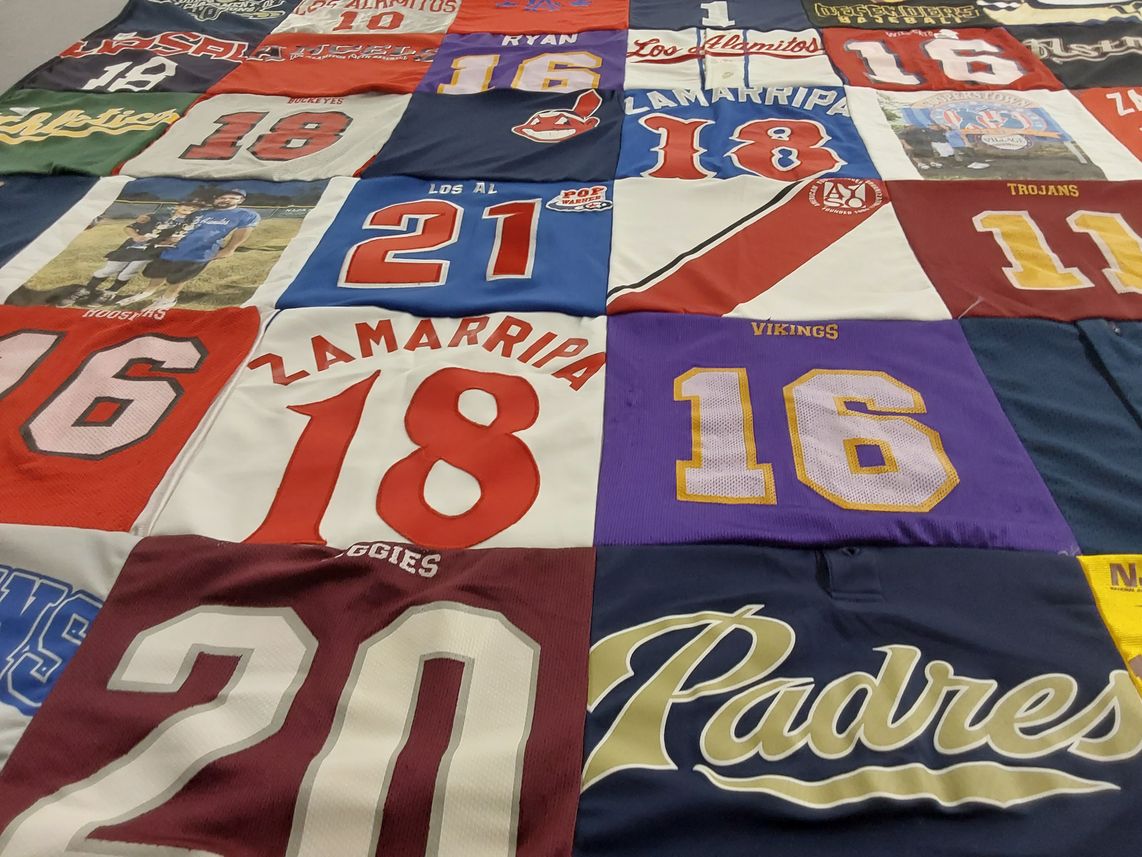 T-shirt quilt featuring vikings, trojans by Kari from CA