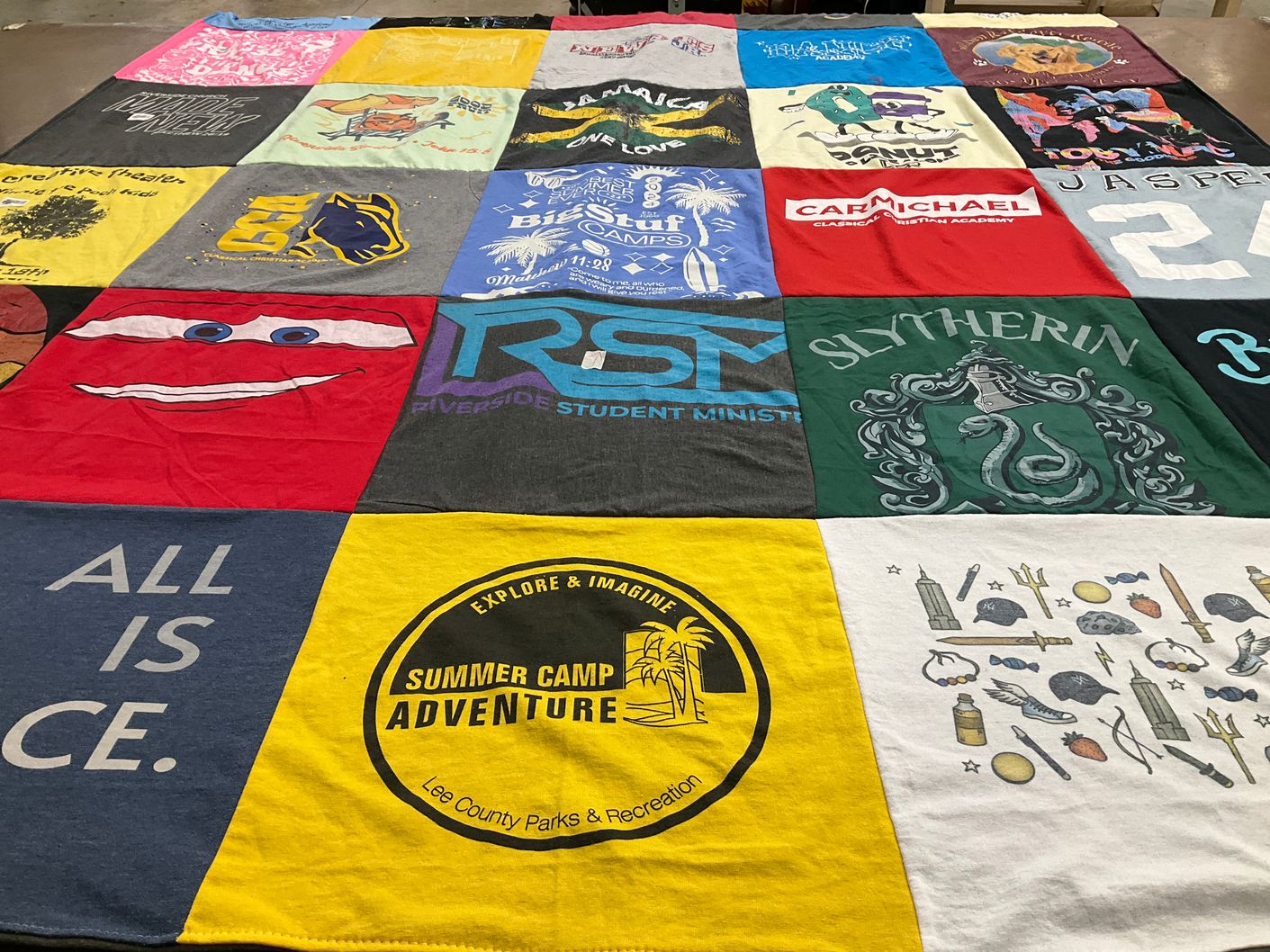 T-shirt quilt with theater, camping themes by Ryan from FL