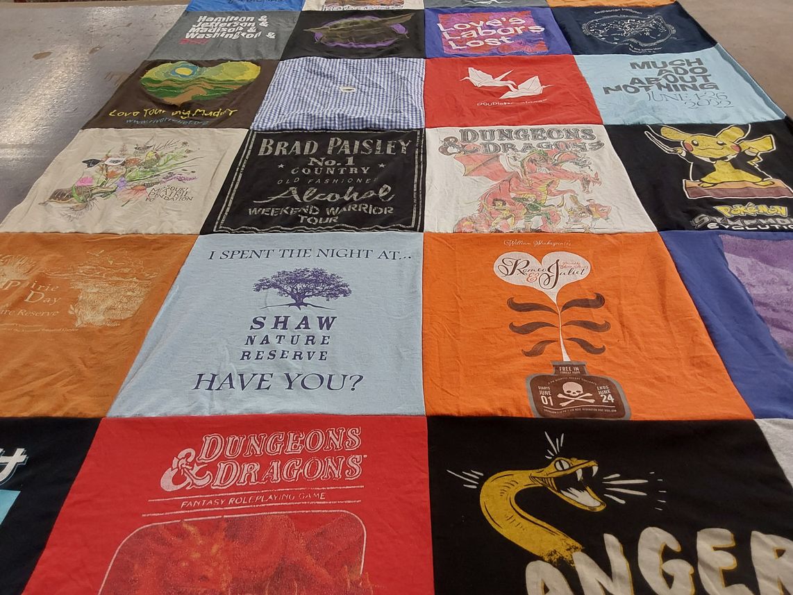 T-shirt quilt with theater, gaming themes by Holly from MO