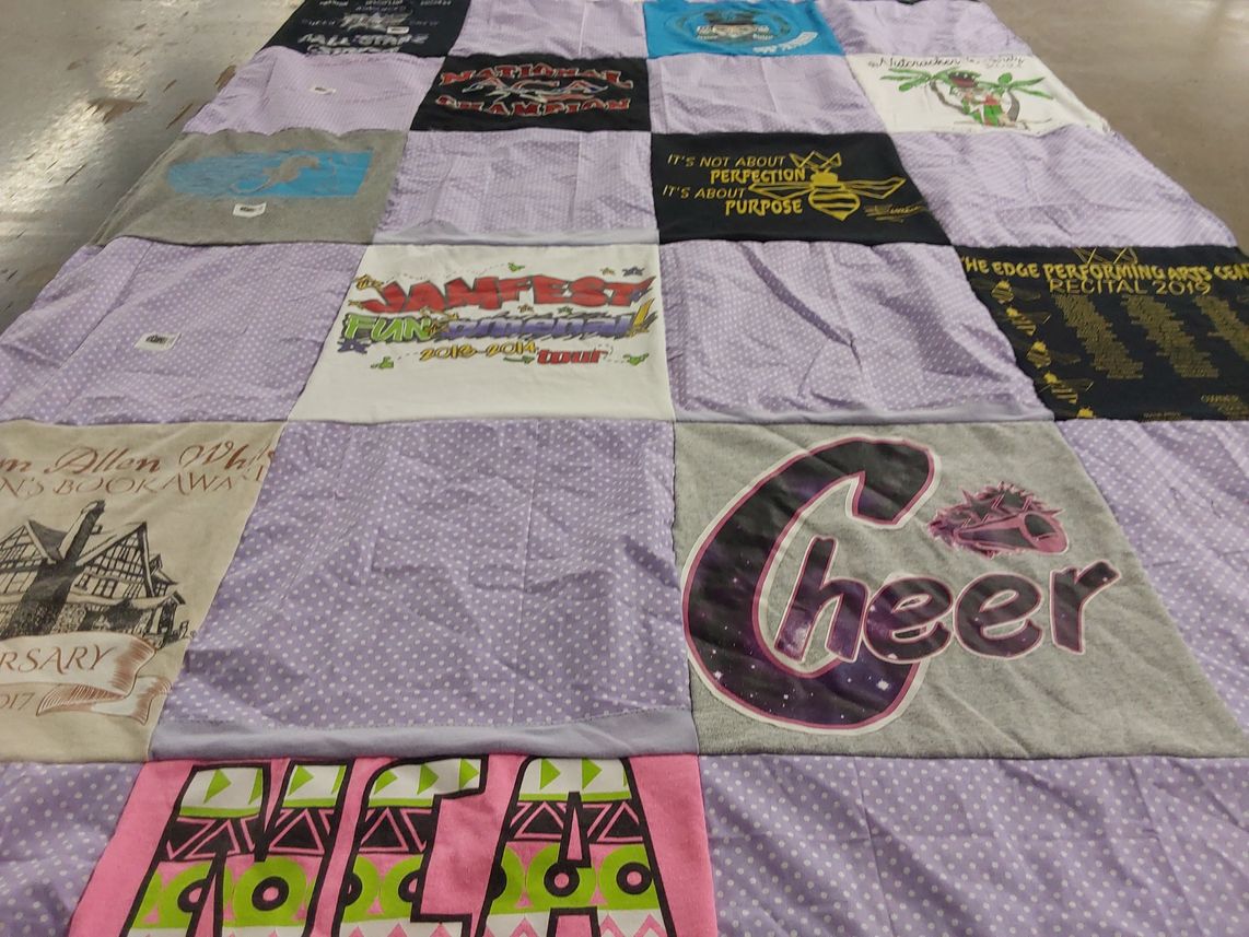 T-shirt quilt with cheerleading, performing arts themes by Amanda from KS