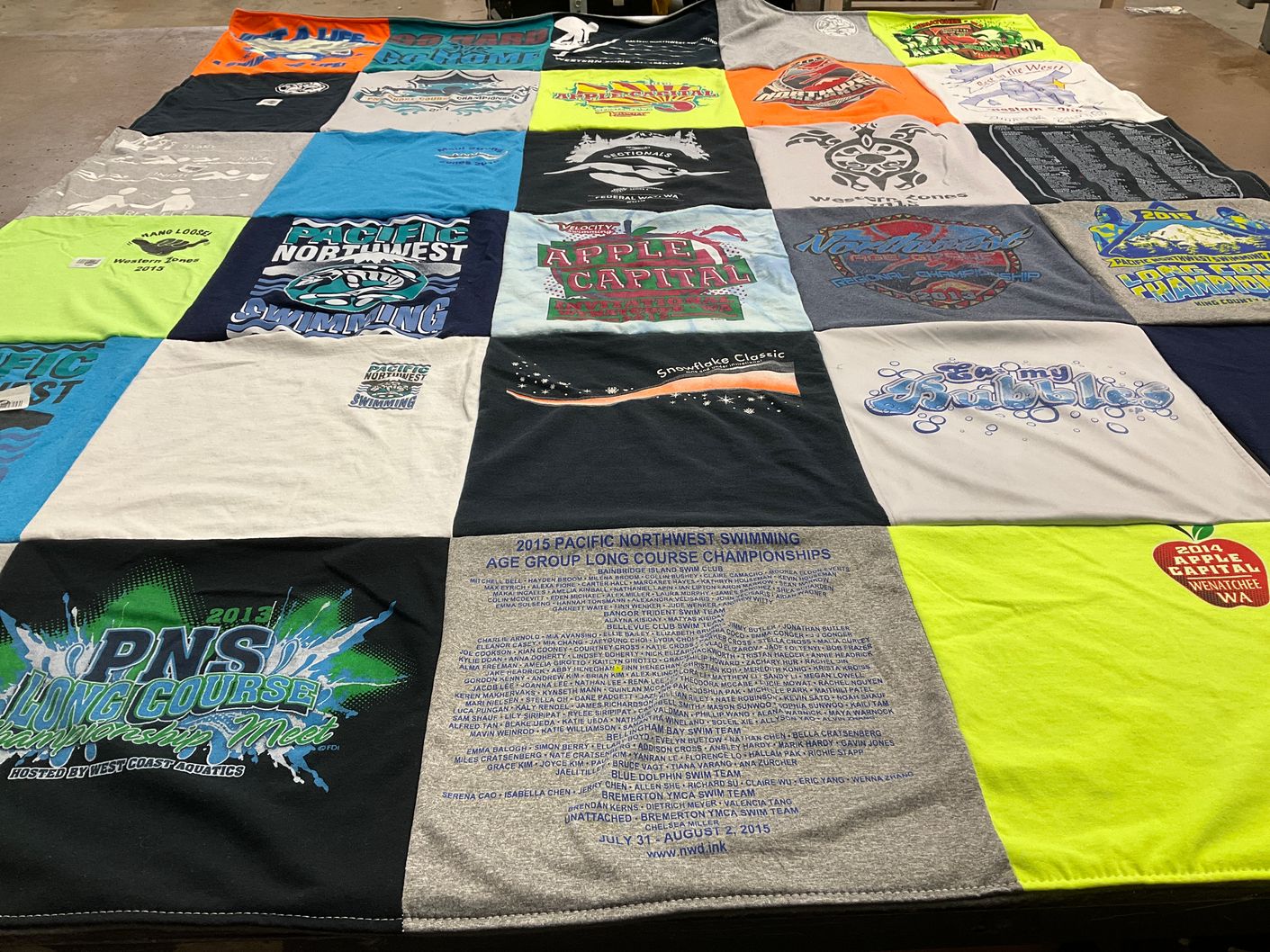 T-shirt quilt with swimming, athletics themes by Kristyn  from PA