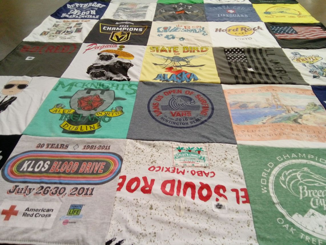 T-shirt quilt with travel, events themes by Kat from AZ