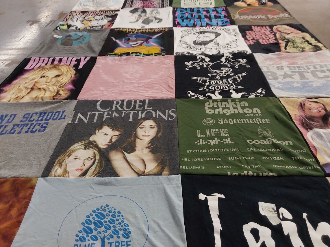 T-shirt quilt with music, movies themes by Iain from CA