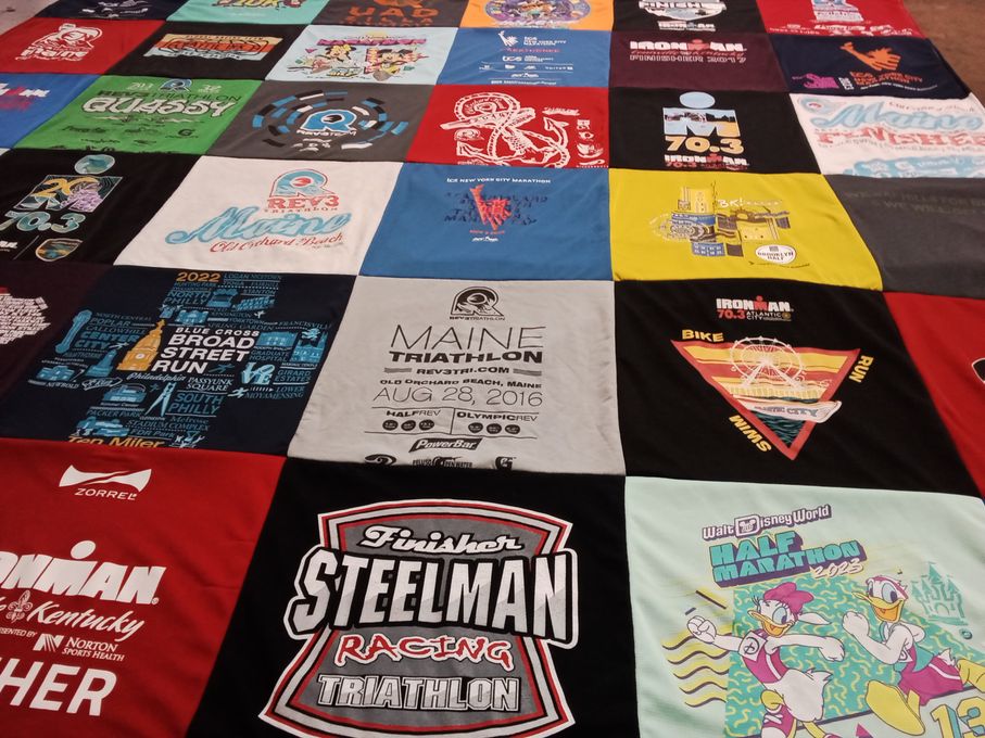 T-shirt quilt with sports, running themes by Wendy from PA