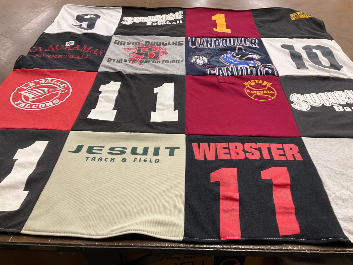 T-shirt quilt featuring clackamas basketball, vancouver canucks by Linda from OR