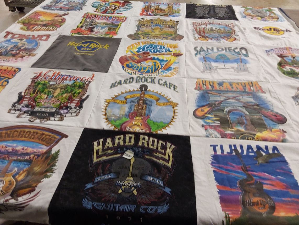 T-shirt quilt with music, travel themes by Kathleen from AZ