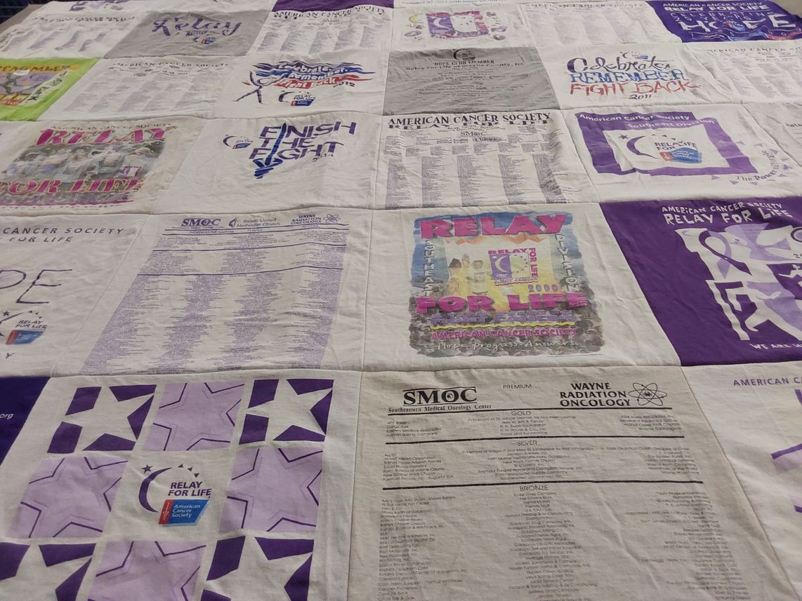 T-shirt quilt with cancer awareness, fundraising themes by Kathy from NC