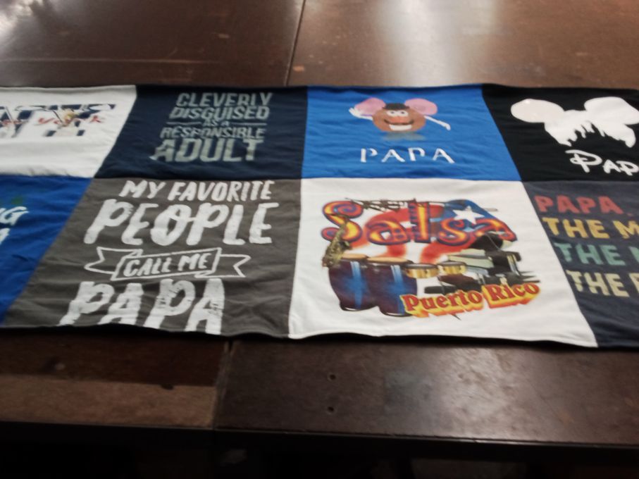 T-shirt quilt with family, salsa dancing themes by Emily from FL