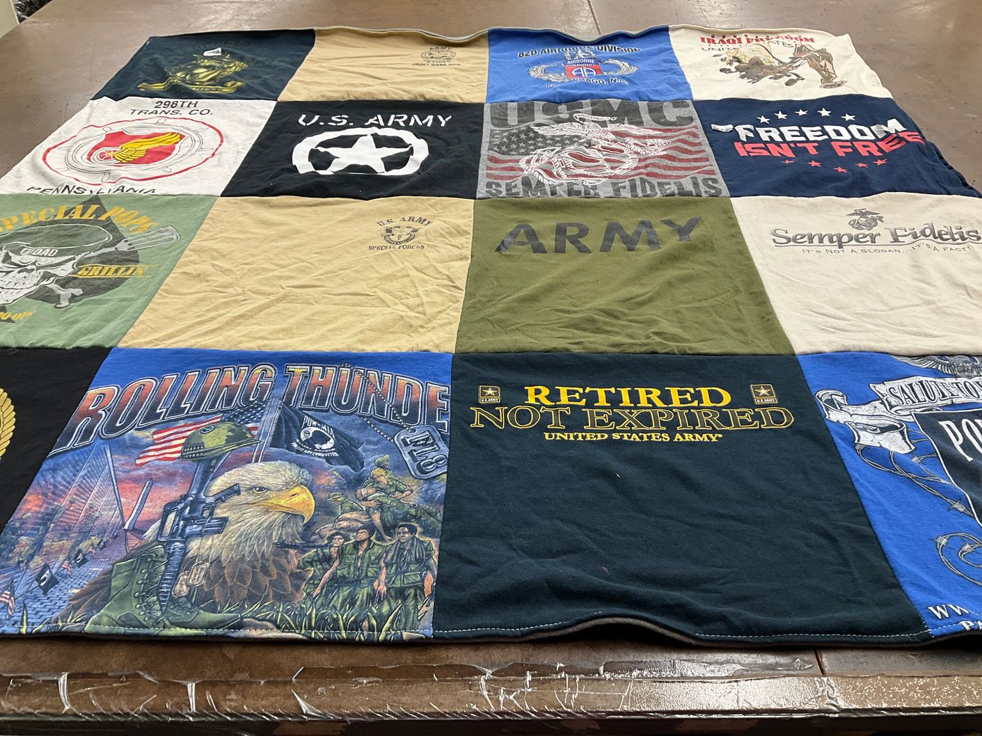 T-shirt quilt with military themes by Emily from FL