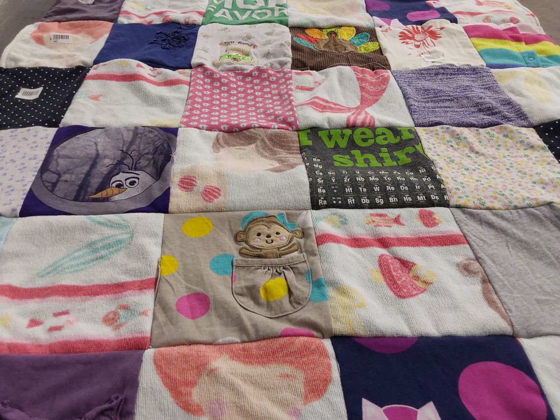 T-shirt quilt with cartoons, animals themes by Hilary from KS