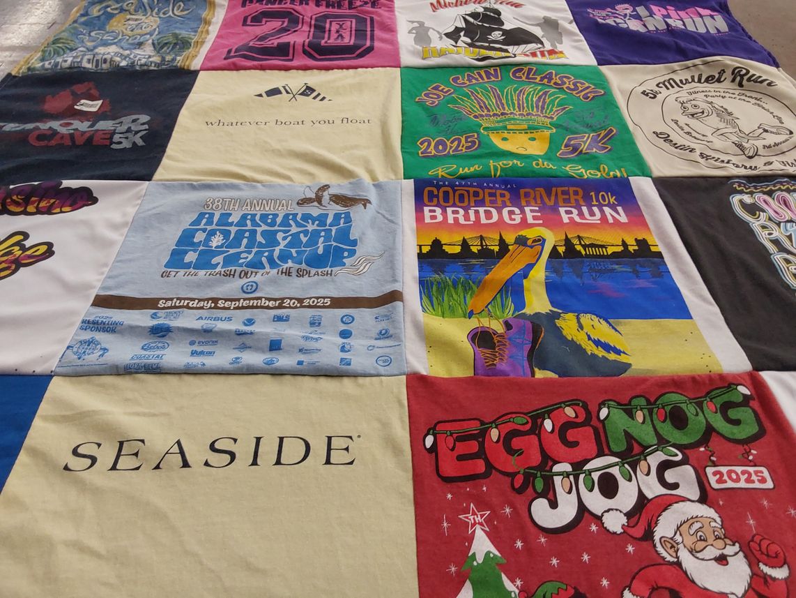 T-shirt quilt with running, environmental cleanup themes by Shelley from FL