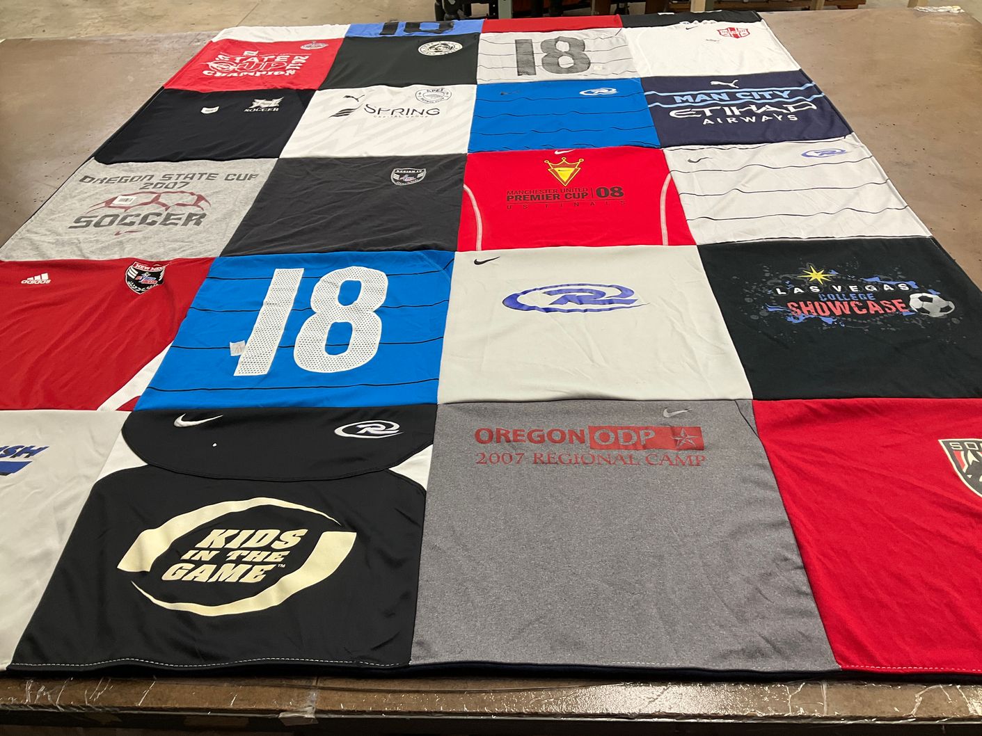 T-shirt quilt with soccer themes by Lauren from ID