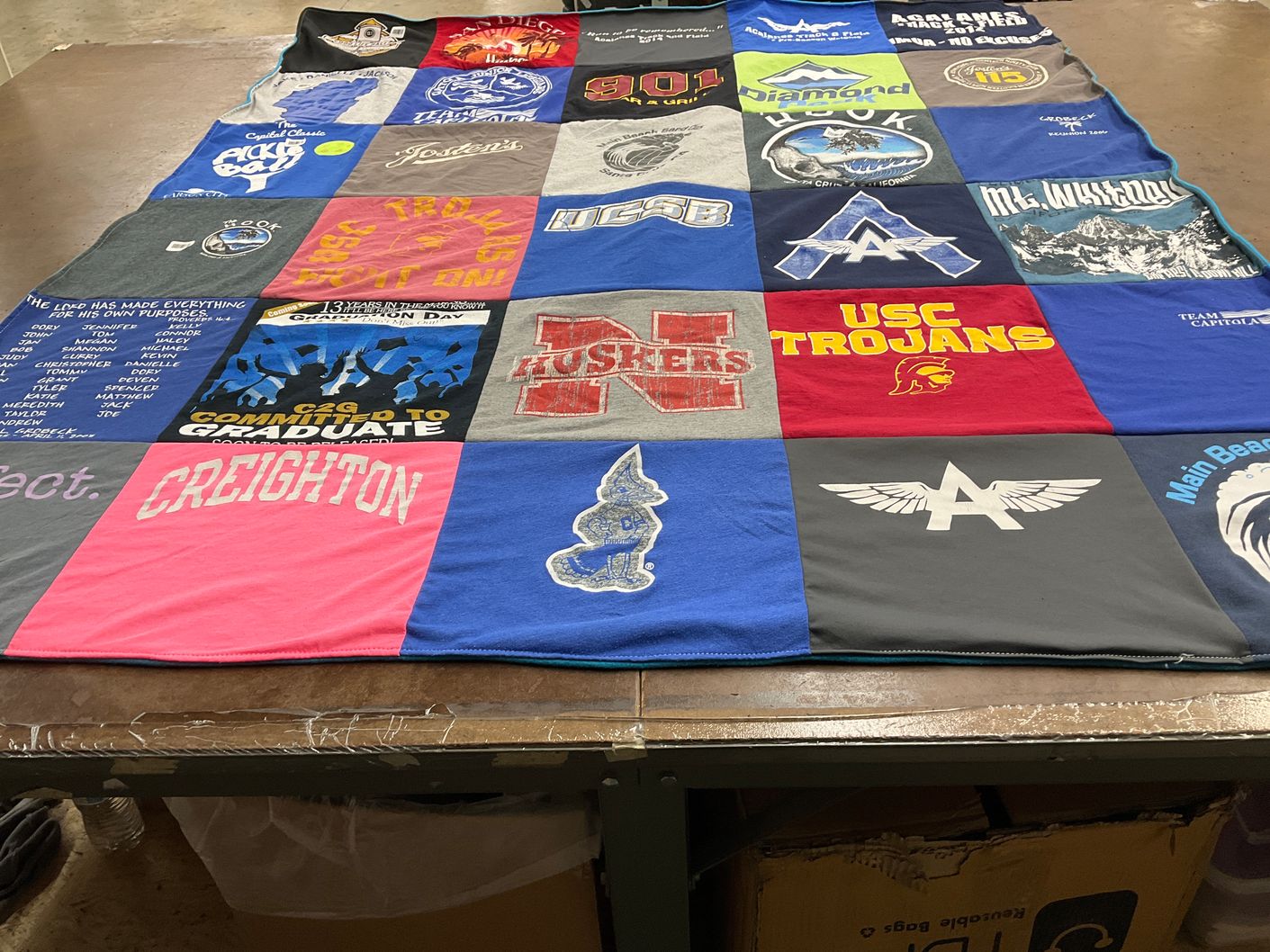 T-shirt quilt featuring university of southern california trojans, university of nebraska huskers by Danny from NV