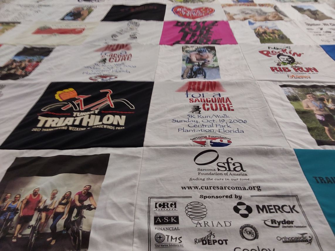 T-shirt quilt with running, cycling themes by Mark from FL