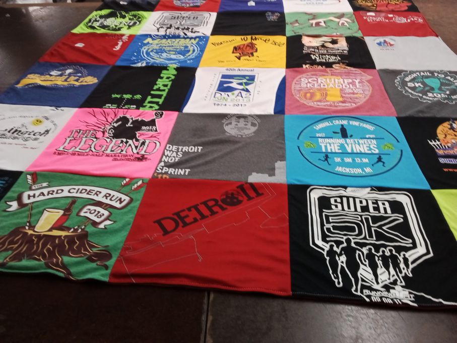 T-shirt quilt with running, sports themes by Vicky from MI